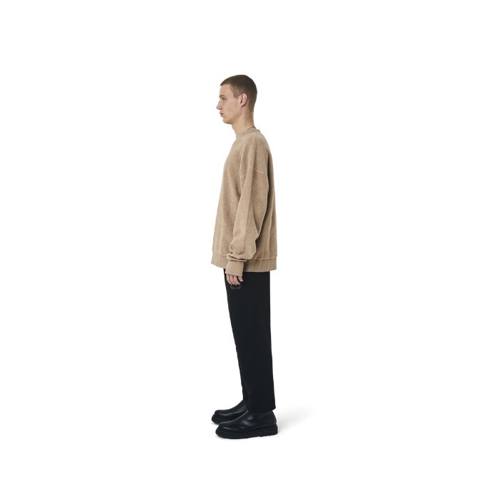 Long sleeves loose cut jumper in burnt beige color fabric featuring Eighteen Eighty-Six embroidered at front. Rib knit at cuffs and hem.