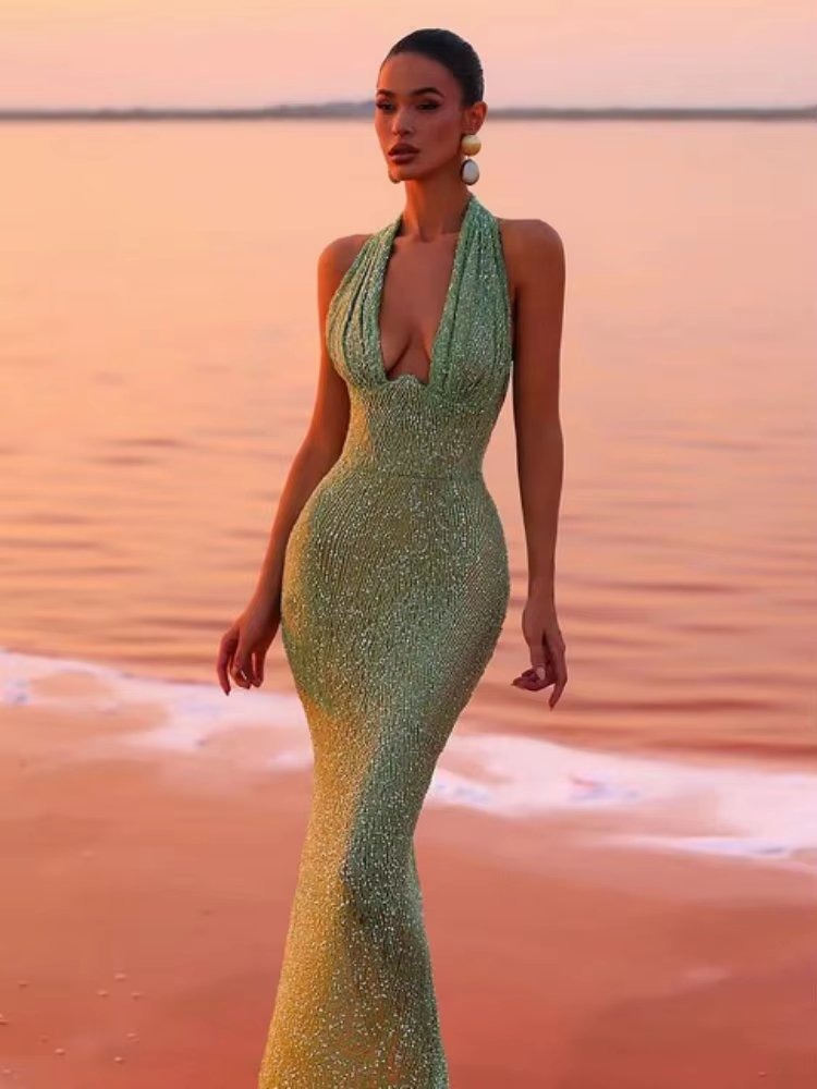 Selvara – Green sequin dress with open back and halter neckline